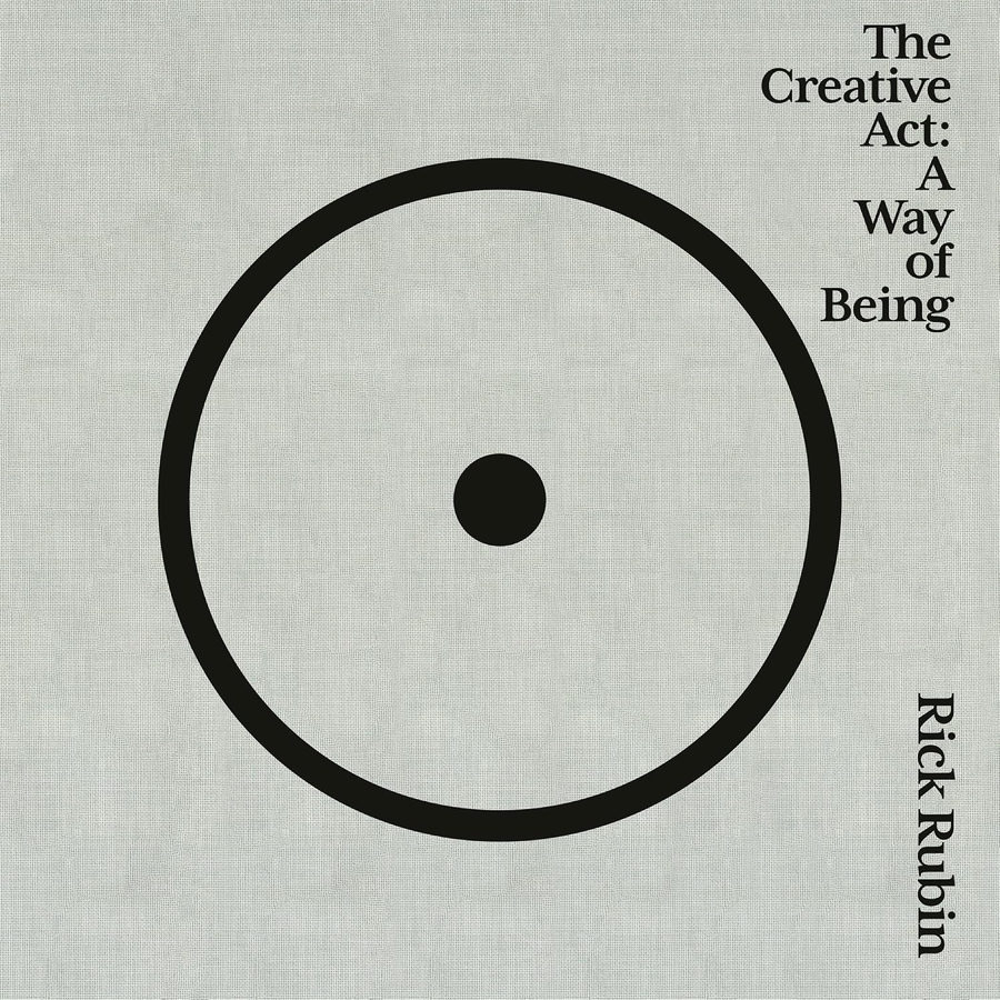 The Creative Act: A Way of Being by Rick Rubin. A pale linen cover with a large black circle and a single dot at its centre.